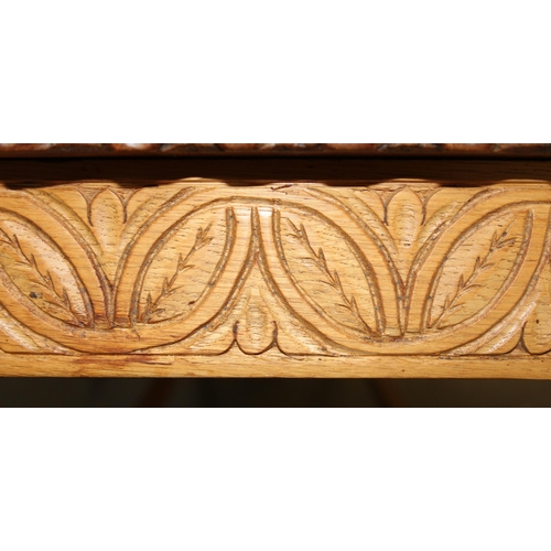 168 - Light oak carved coffee table