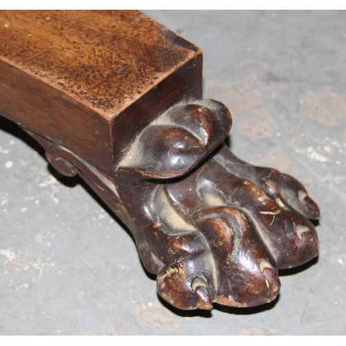 65 - A 19th century mahogany tilt topped breakfast table with pedestal base and carved lion paw feet, app... 