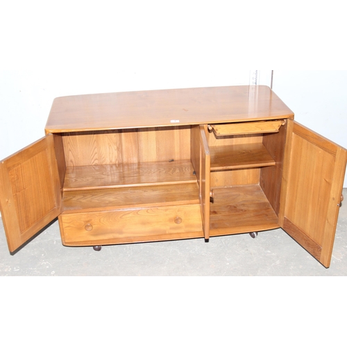 1 - A retro Ercol Windsor model 366 elm sideboard, approx 115cm wide