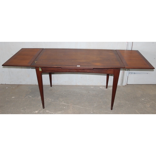 10B - A mid-century extending dining table and 4 chairs, seemingly unmarked but somewhat matching the A. Y... 