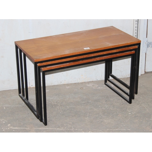 17 - A set of 3 vintage retro graduated tables with metal framed legs, the largest approx 84cm wide