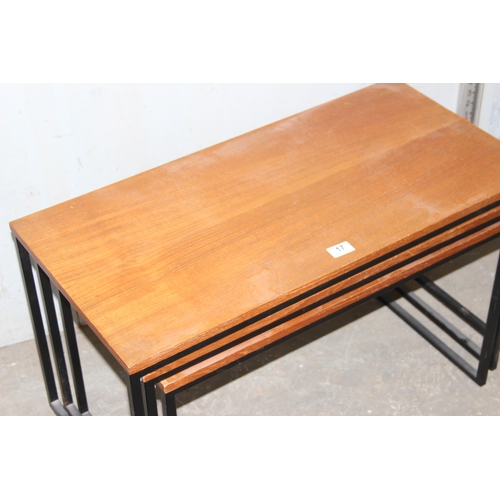 17 - A set of 3 vintage retro graduated tables with metal framed legs, the largest approx 84cm wide