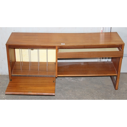 18 - A retro teak record cabinet, approx 127cm wide