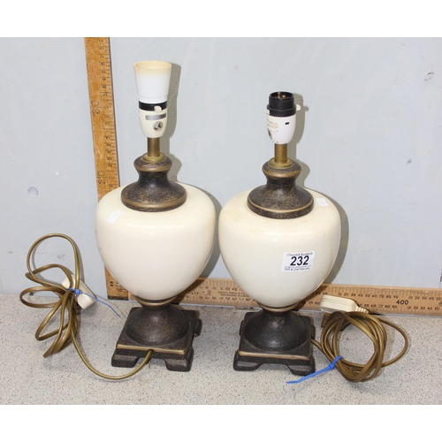 232 - A pair of decorative pottery lamp bases