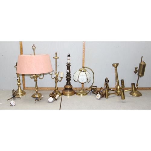 234 - 8 assorted brass lamps