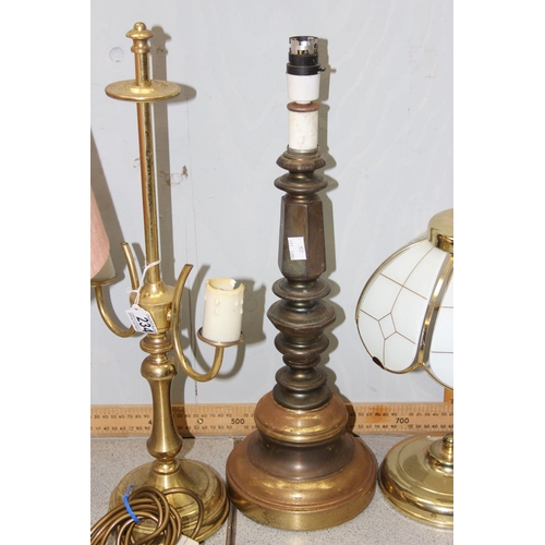 234 - 8 assorted brass lamps