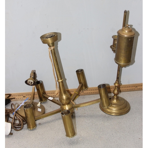 234 - 8 assorted brass lamps