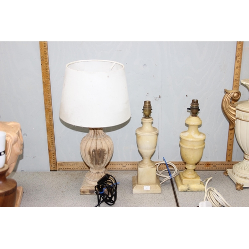 235 - 9 assorted vintage lamps, pottery, alabaster, wooden etc, some shades