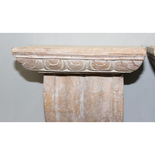 280 - A pair of Italian style carved wooden wall brackets, approx 37cm tall each