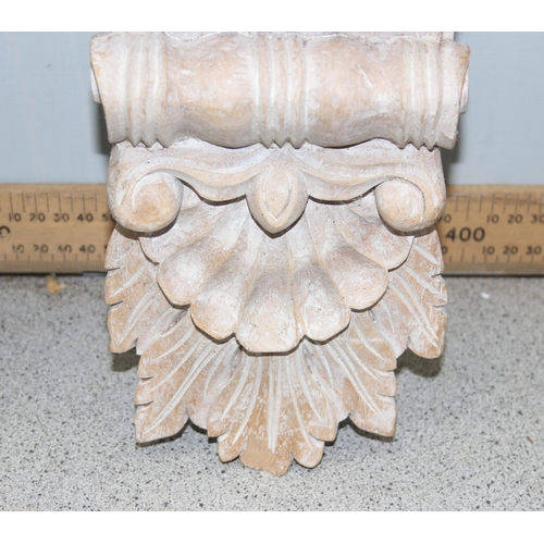 281 - A pair of Italian style carved wooden wall brackets, approx 37cm tall each