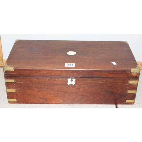 283 - Antique rosewood writing slope with brass bound corners