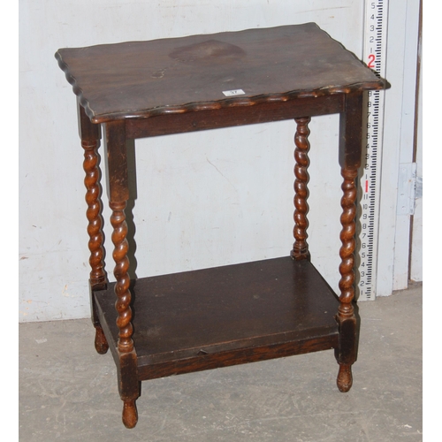 37 - An early 20th century oak table with barleytwist legs