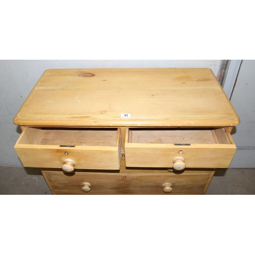 43 - A Victorian stripped pine 2 over 3 chest of drawers with bun handles, approx 95cm wide