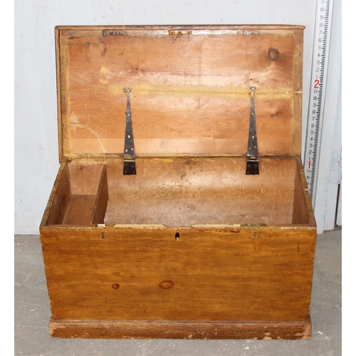 52 - An antique scumbled pine flat topped box with iron handles, approx 80cm wide