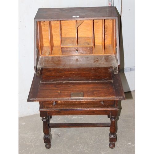 61 - A small early 20th century oak bureau, approx 51cm wide