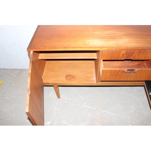 7 - A long retro mid-century Nathan sideboard with 3 drawers and 3 cupboards, approx 214cm wide