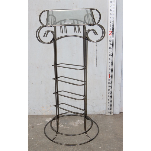 73 - A wrought metal and glass topped jardinière stand and wine rack formed as an ionic column, approx 79... 