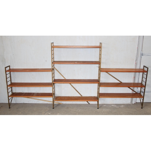 74 - A retro mid-century modular shelving unit believed to be Ladderax but unmarked, 10 shelves with 4 up... 