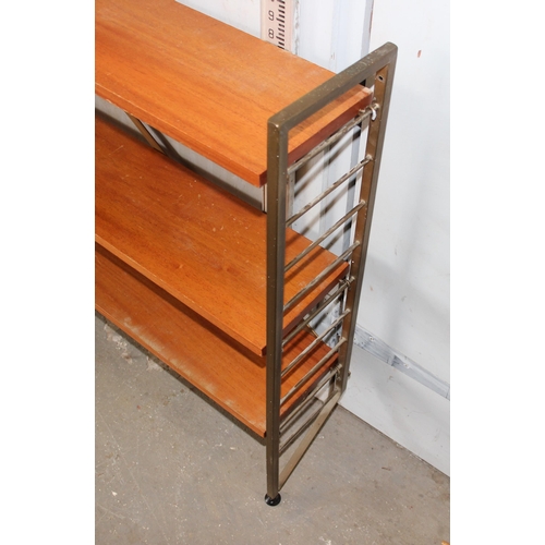 74 - A retro mid-century modular shelving unit believed to be Ladderax but unmarked, 10 shelves with 4 up... 