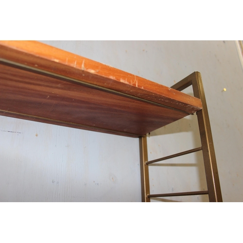 74 - A retro mid-century modular shelving unit believed to be Ladderax but unmarked, 10 shelves with 4 up... 