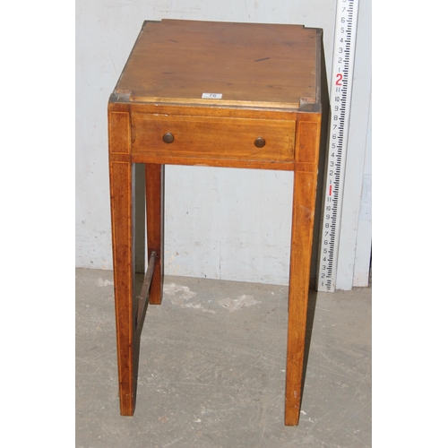 76 - A small Edwardian table with single drawer