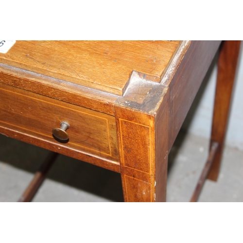 76 - A small Edwardian table with single drawer