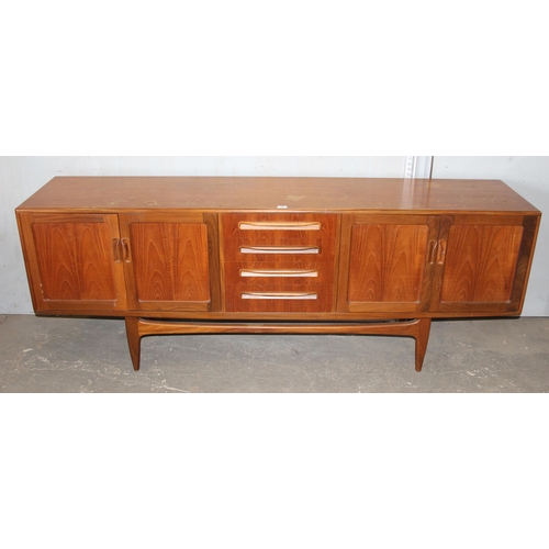 8 - A retro G-Plan teak sideboard with 4 drawers and 4 cupboards, approx 214cm wide