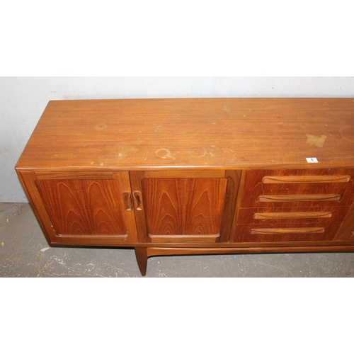 8 - A retro G-Plan teak sideboard with 4 drawers and 4 cupboards, approx 214cm wide