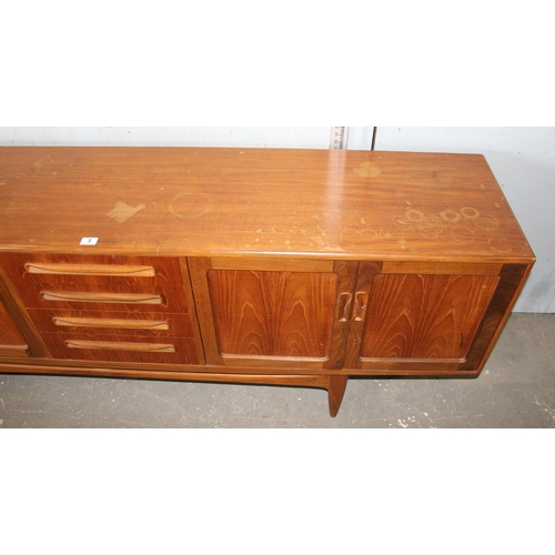 8 - A retro G-Plan teak sideboard with 4 drawers and 4 cupboards, approx 214cm wide