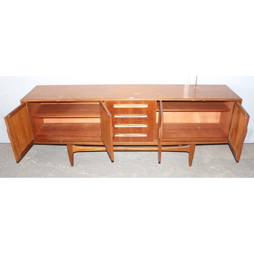 8 - A retro G-Plan teak sideboard with 4 drawers and 4 cupboards, approx 214cm wide