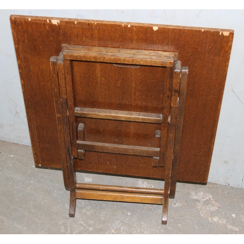 142 - A small folding table and a vintage embroidered fire screen