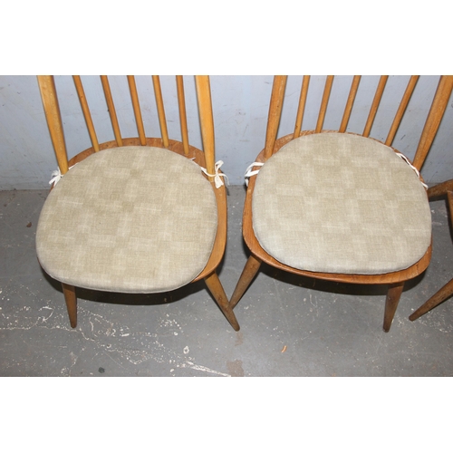 144 - A set of 4 retro Ercol Quaker model 365 dining chairs in blonde finish, with cushions, one with blue... 