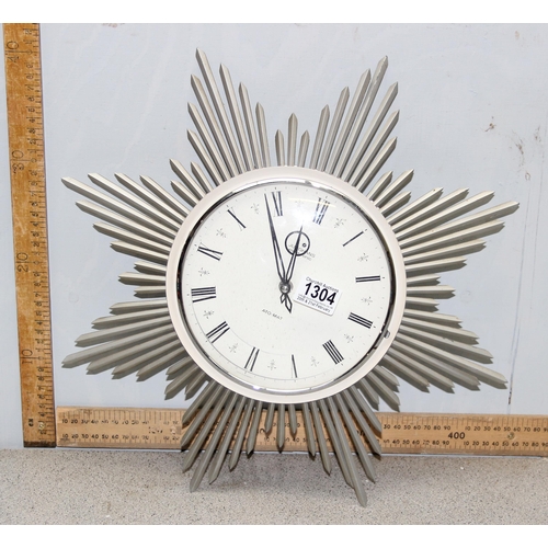 1304 - A vintage Junghans Ato-Mat sunburst wall clock