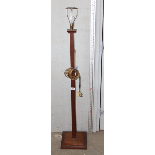 237 - An Art Deco period oak standard lamp