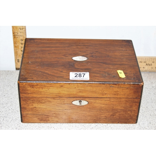 287 - An antique rosewood sewing box and contents