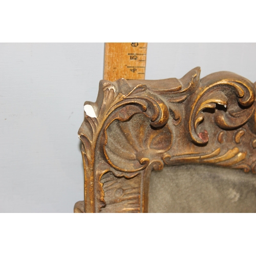 382 - An antique decorative gilt framed plaster mirror, likely 19th century approx 60cm x 43cm