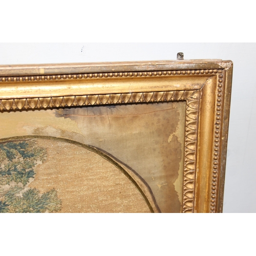 404 - A Georgian needlework and painted panel in verre églomisé mount and gilt frame, approx 48cm x 38cm