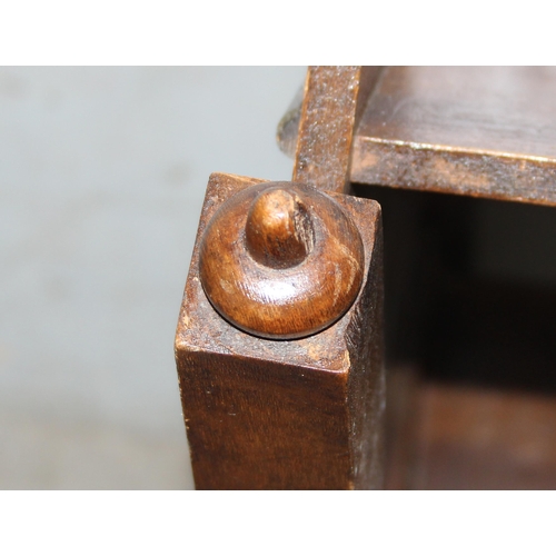 89 - An early 20th century wooden book trough with bobbin turned legs, approx 56cm wide