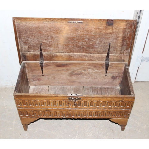 94 - Small antique carved raised coffer with key