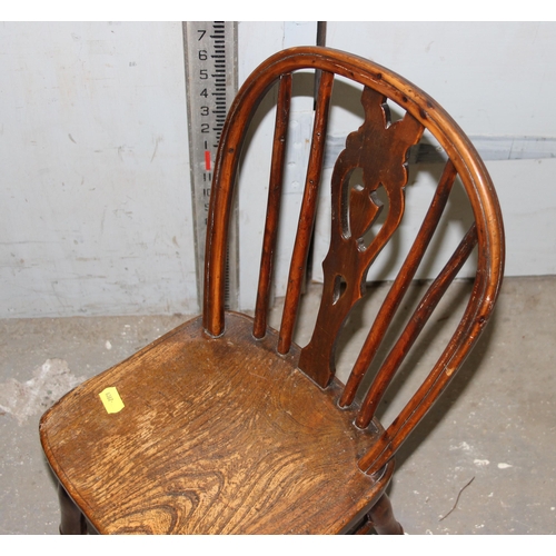 96 - Childs rocking chair with rope strung seat & an antique child's elm seated hoop back chair