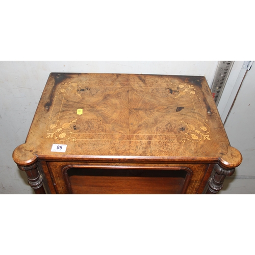 99 - A 19th century walnut music cabinet with marquetry inlay