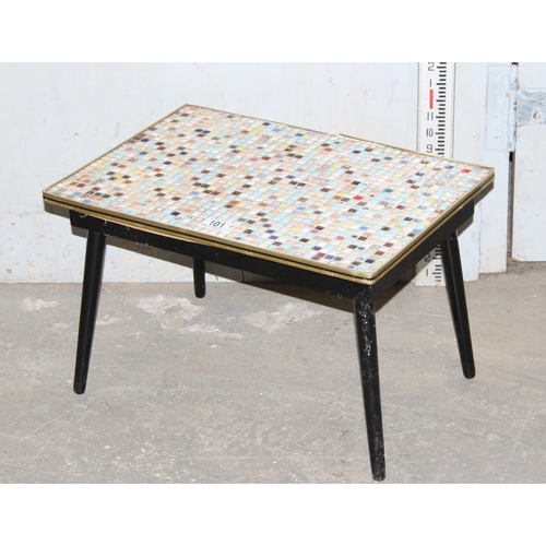 101 - A small retro mosaic topped table, approx 50cm x 34cm