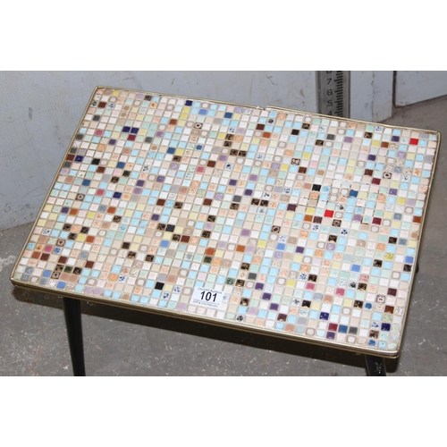 101 - A small retro mosaic topped table, approx 50cm x 34cm