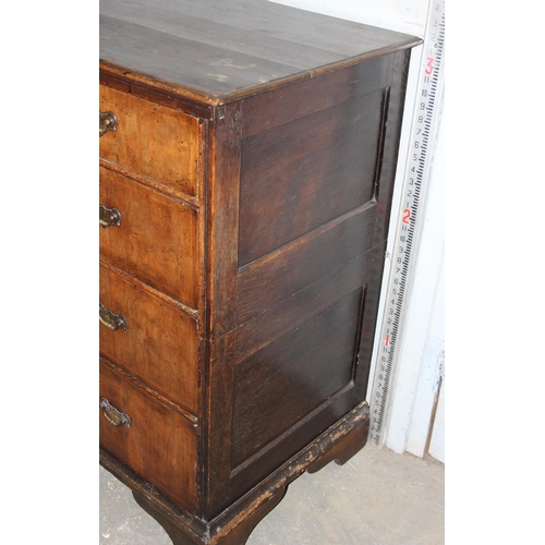 103 - An 18th century 2 over 3 chest of drawers with walnut veneer over oak carcass, panelled ends, approx... 