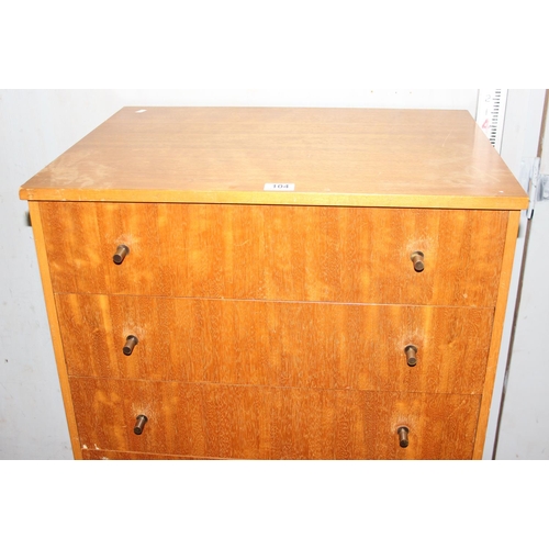 104 - A retro 7 drawer chest of drawers, seemingly unnamed with distinctive metal handles, approx 125cm ta... 