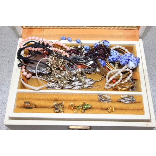 1114 - A large qty of assorted costume jewellery some boxed, some coins etc