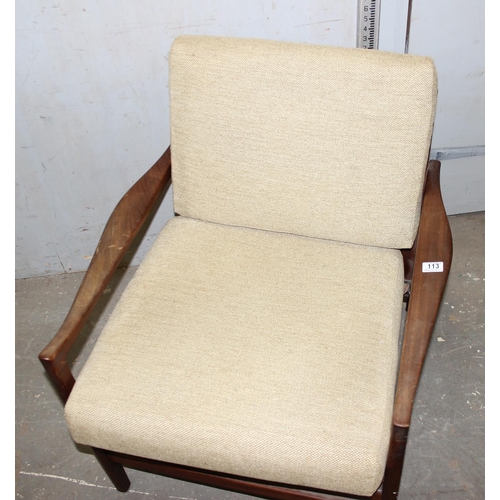 113 - A Scandinavian style retro teak framed armchair with cushions, seemingly unmarked