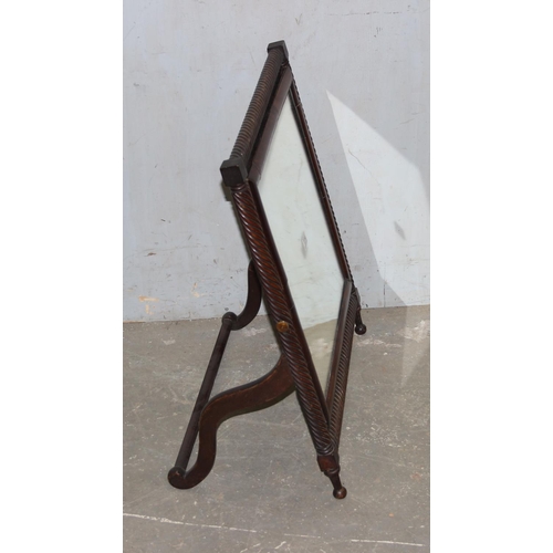 114 - An unusual 19th century mahogany framed table top mirror with reeded supports, approx 70cm x 60cm in... 