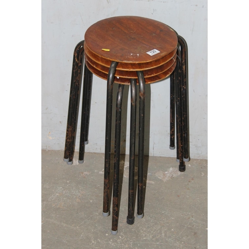 120 - A set of 4 retro stacking stool comprising of a bentwood top and a metal tripod base, by Nestool