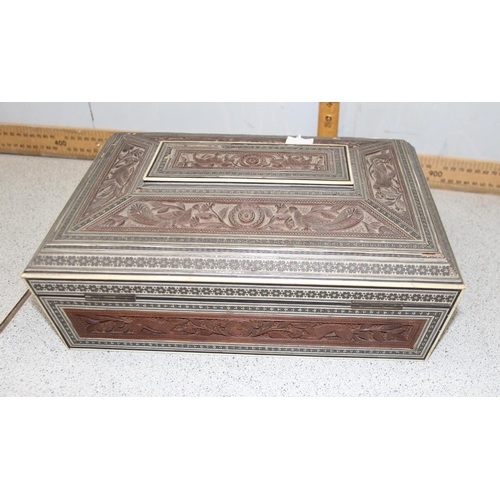 294 - A 19th century Anglo-Indian Vizagapatam work box with sadeli inlay and carved details, approx 32cm w... 